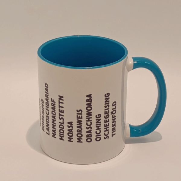 Blaue Tasse mit den zum Landkreis Fürstenfeldbruck gehörenden Ortsnamen