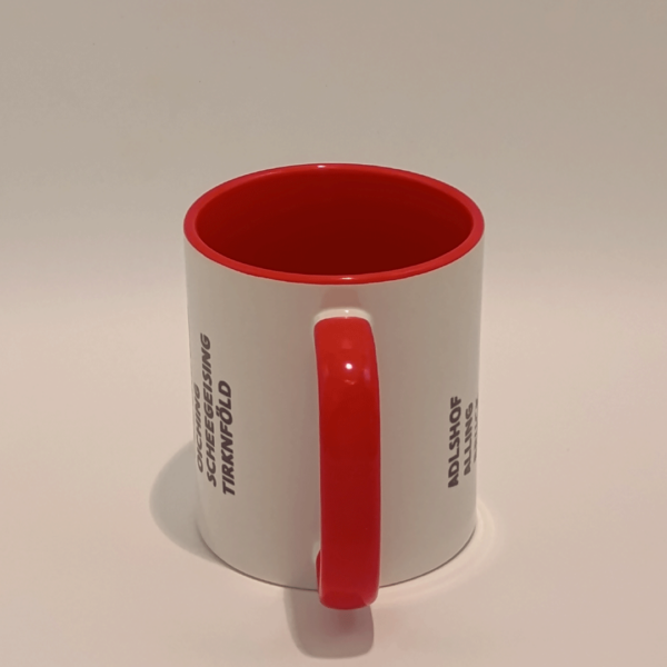 Rote Tasse mit den zum Landkreis Fürstenfeldbruck gehörenden Ortsnamen